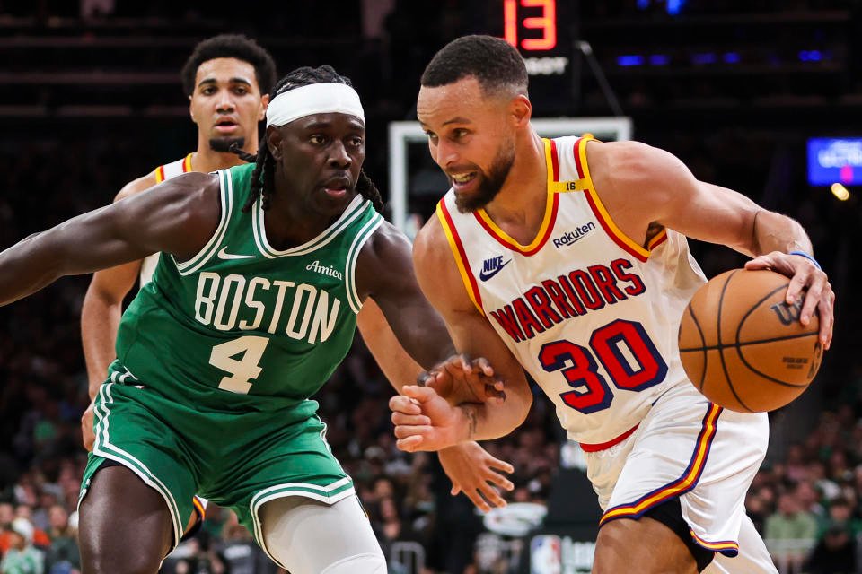 BOSTON, MA - NOVEMBER 6:  Stephen Curry #30 of the Golden State Warriors drives to the basket while guarded by Jrue Holiday #4 of the Boston Celtics during a game at TD Garden on NOVEMBER 6:, 2024 in Boston, Massachusetts. NOTE TO USER: User expressly acknowledges and agrees that, by downloading and or using this photograph, User is consenting to the terms and conditions of the Getty Images License Agreement. (Photo by Adam Glanzman/Getty Images)