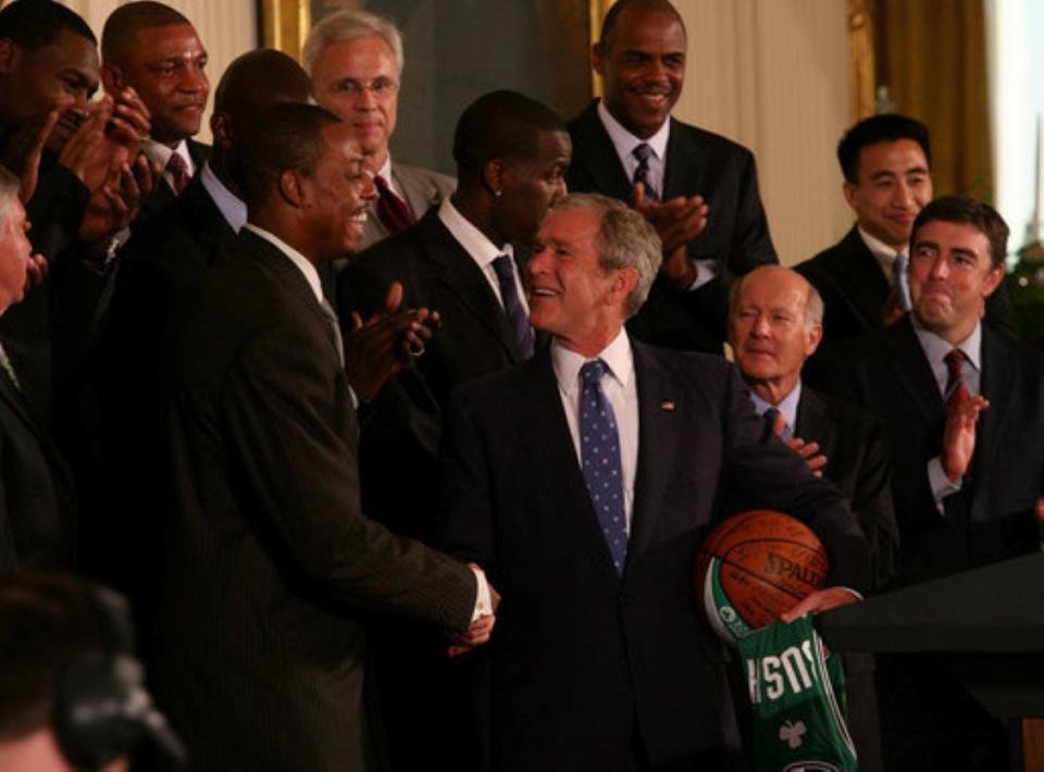 This Sept. 19, 2008, photo shows President George W. Bush and Boston Celtics captain Paul Pierce shake hands as the team visited the White House following their championship victory.