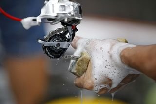 mechanic cleans a chain