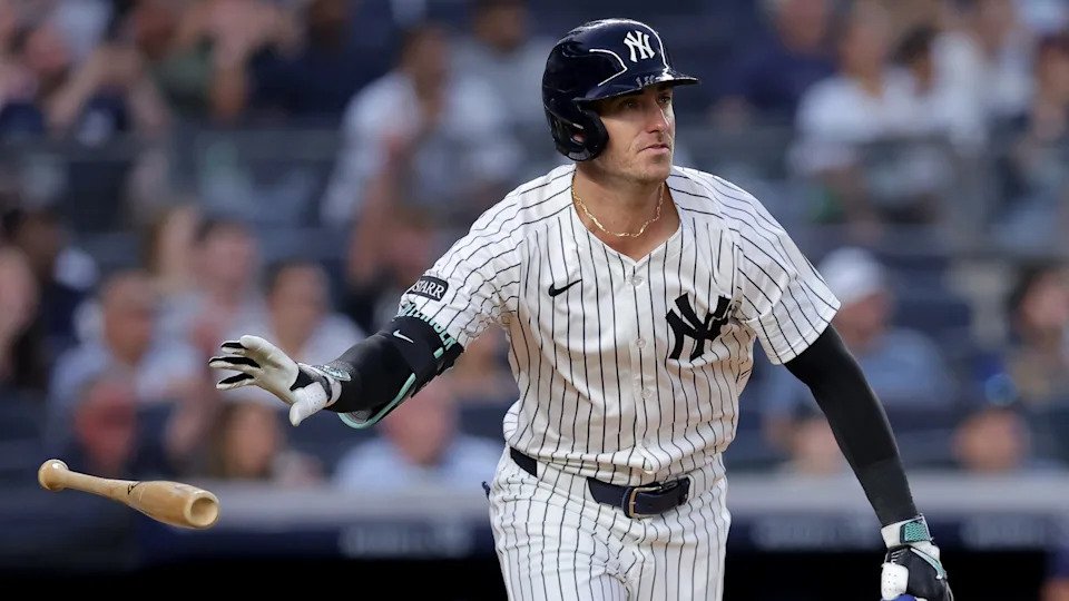 Jul 29, 2025; Bronx, New York, USA; New York Yankees right fielder Cody Bellinger (35) tosses his bat as he watches his three run home run against the Tampa Bay Rays during the third inning at Yankee Stadium.