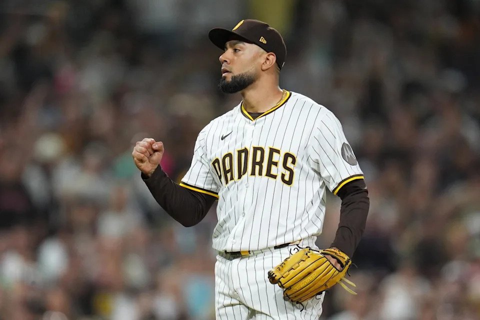 Padres relief pitcher Robert Suárez celebrates after San Diego defeated the Arizona Diamondbacks on Sept. 27.