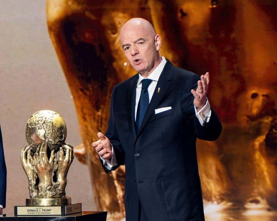 President Trump receives the FIFA Peace Prize from FIFA President Gianni Infantino at the 2026 World Cup Draw.