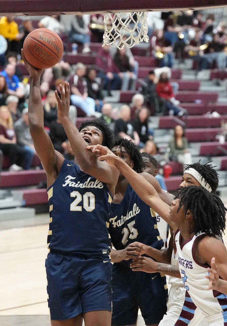 Fairdale's Ferlandes Wright (20) makes the shot against Jeffersontown in a  Sixth Region quarterfinal March 4.