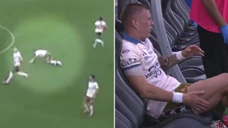 Moment unlucky footballer collapses with injury seconds before kick-off before breaking down in tears on bench