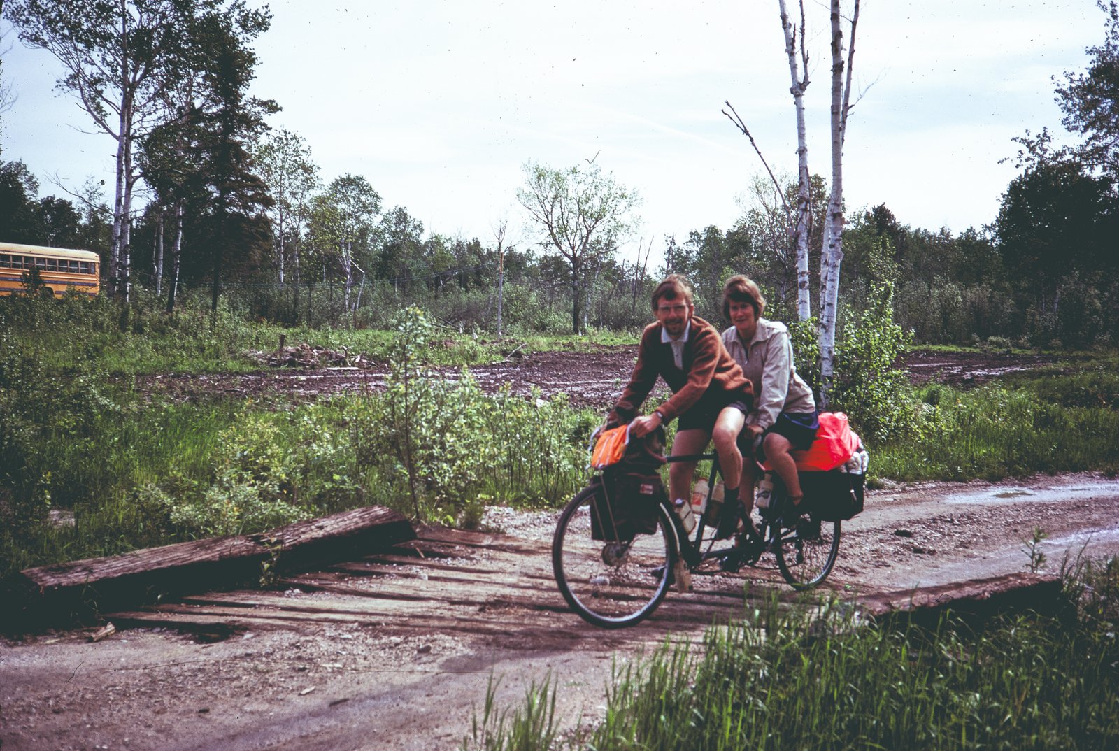 Two people on a tandem bike