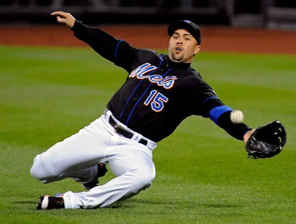 New York Mets right fielder Carlos Beltran lunges for the ball during the third inning of an MLB baseball game against the Arizona Diamondbacks, April 22, 2011 in New York. AP