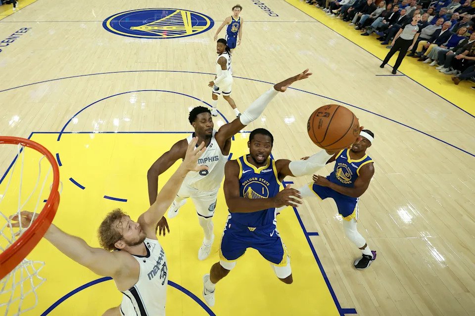 SAN FRANCISCO, CALIFORNIA - OCTOBER 27: Jonathan Kuminga #1 of the Golden State Warriors goes up for a shot on Jaren Jackson Jr. #8 and Jock Landale #31 of the Memphis Grizzlies at Chase Center on October 27, 2025 in San Francisco, California. NOTE TO USER: User expressly acknowledges and agrees that, by downloading and/or using this photograph, user is consenting to the terms and conditions of the Getty Images License Agreement.  (Photo by Ezra Shaw/Getty Images)