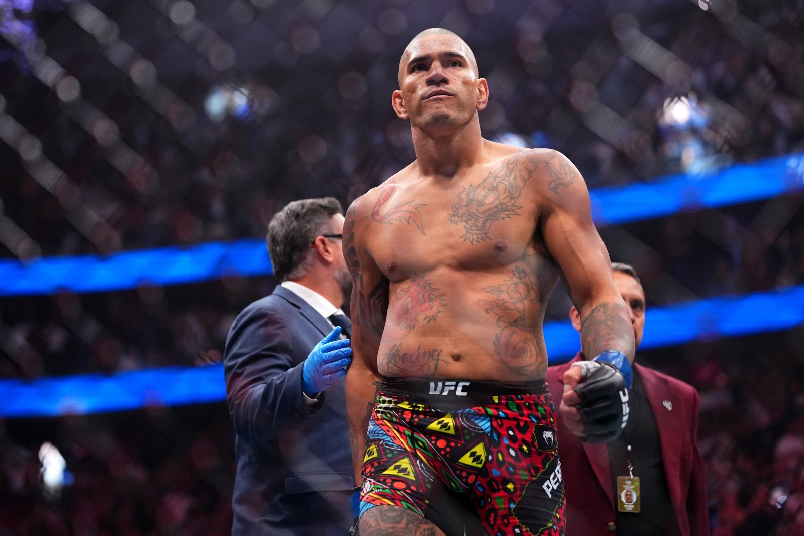 LAS VEGAS, NEVADA - OCTOBER 04: Alex Pereira of Brazil enters the Octagon in the UFC light heavyweight championship fight during the UFC 320 event at T-Mobile Arena on October 04, 2025 in Las Vegas, Nevada. (Photo by Cooper Neill/Zuffa LLC)