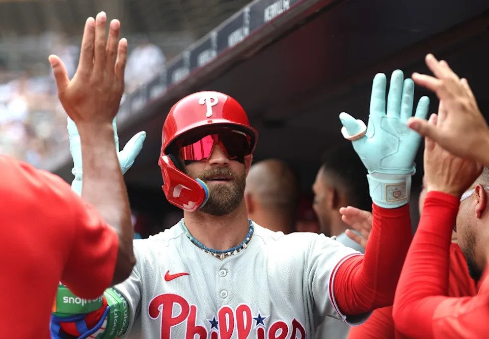 Phillies’ Bryce Harper celebrates after hitting a home run against New York at Yankee Stadium in July 2025. Getty Images