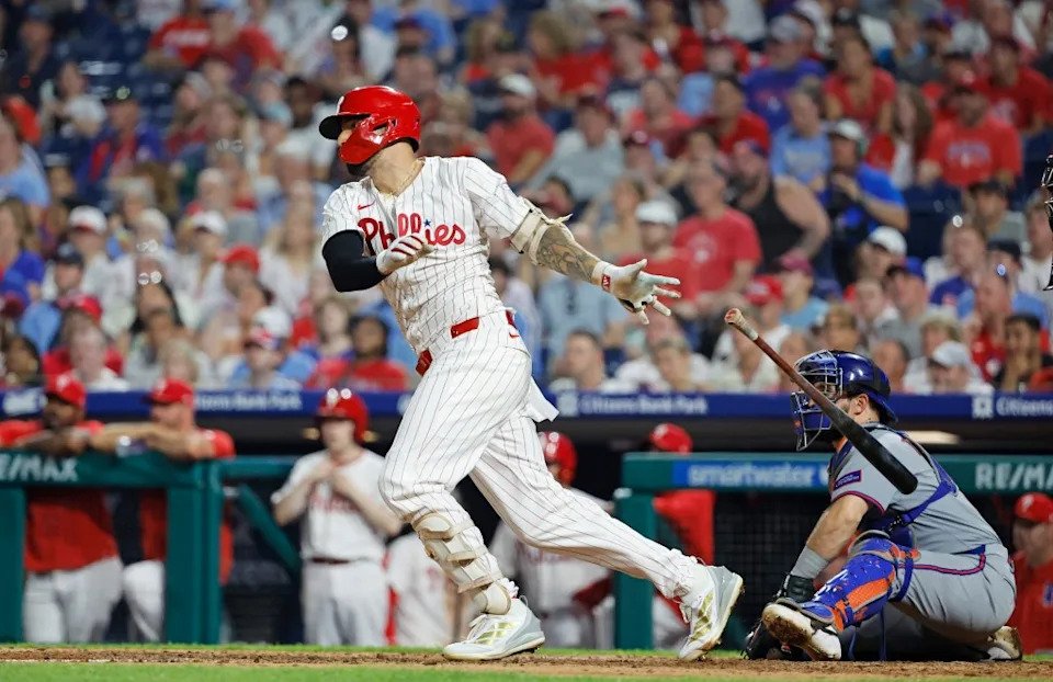 Nick Castellanos hits an RBI double during a Phillies game against the Mets in June 2025. Jason Szenes for the NY Post