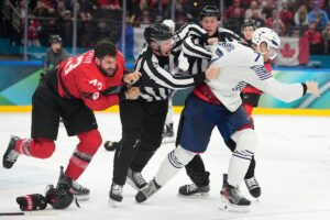 Tom Wilson fights in Canada’s game vs. France at the Olympics