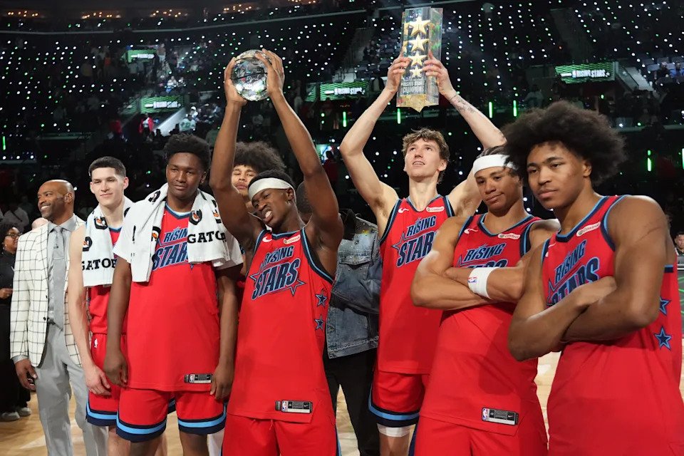 Feb 13, 2026; Inglewood, California, USA; Team Vince VJ Edgecombe (77) of the Philadelphia 76ers celebrates with teammates after defeating Team Melo in an NBA All Star Rising Stars championship game at Intuit Dome. Mandatory Credit: Kirby Lee-Imagn Images
