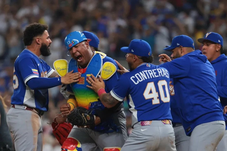 Venezuela celebrates after its World Baseball Classic quarterfinal win on March 14. IMAGN IMAGES via Reuters Connect
