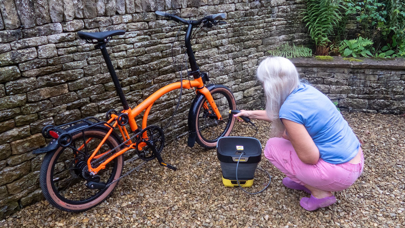 K&auml;rcher Mobile Cleaner OC 3 Foldable being used to wash a Brompton bike.