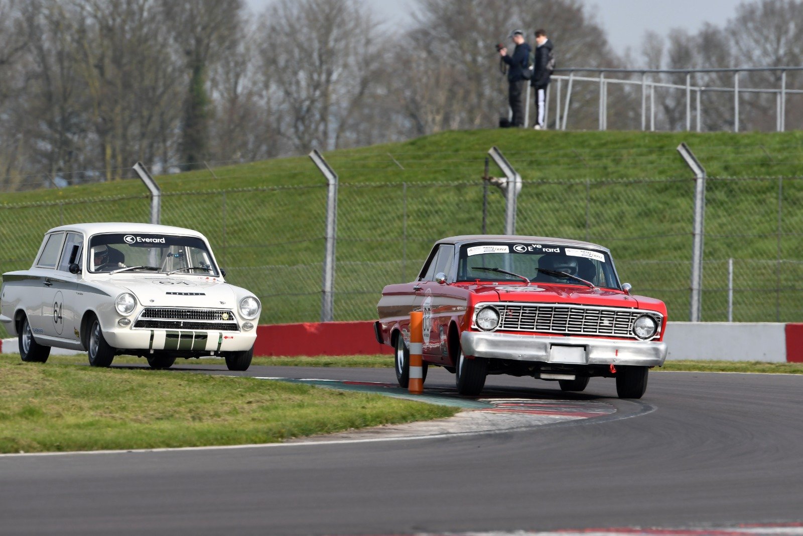 Ahead of the Minis, Piers Grange's Ford Falcon and Simon Gusterson's Cortina battled for the outright wins