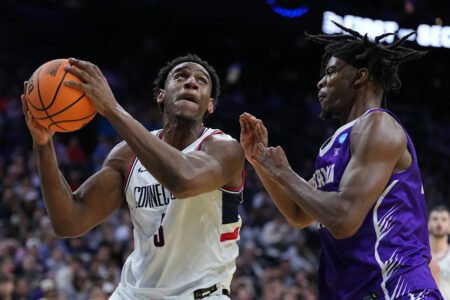 Tarris Reed Jr. has 31 points and 27 rebounds as No. 2 UConn beats Furman 82-71 in NCAA Tournament