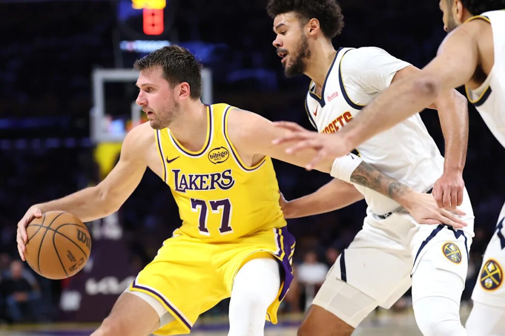 Luka Dončić hits wild fadeaway jumper to lead Lakers over Nuggets in overtime