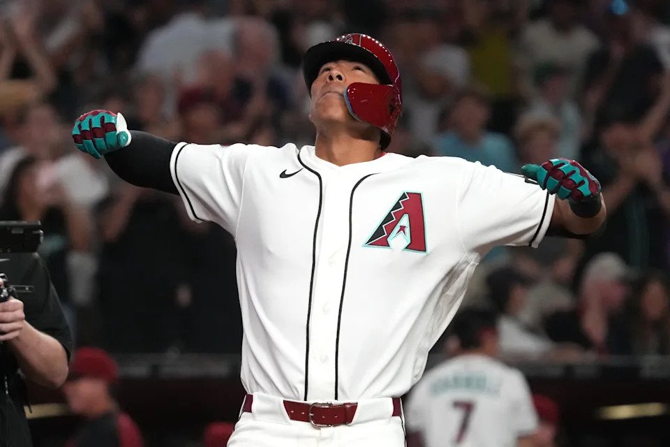 Jose Fernandez celebrates hitting a three-run home run against the Detroit Tigers in the eighth inning at Chase Field on March 31, 2026.
