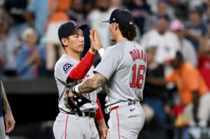 How does the outfield logjam play out inside the Red Sox clubhouse?