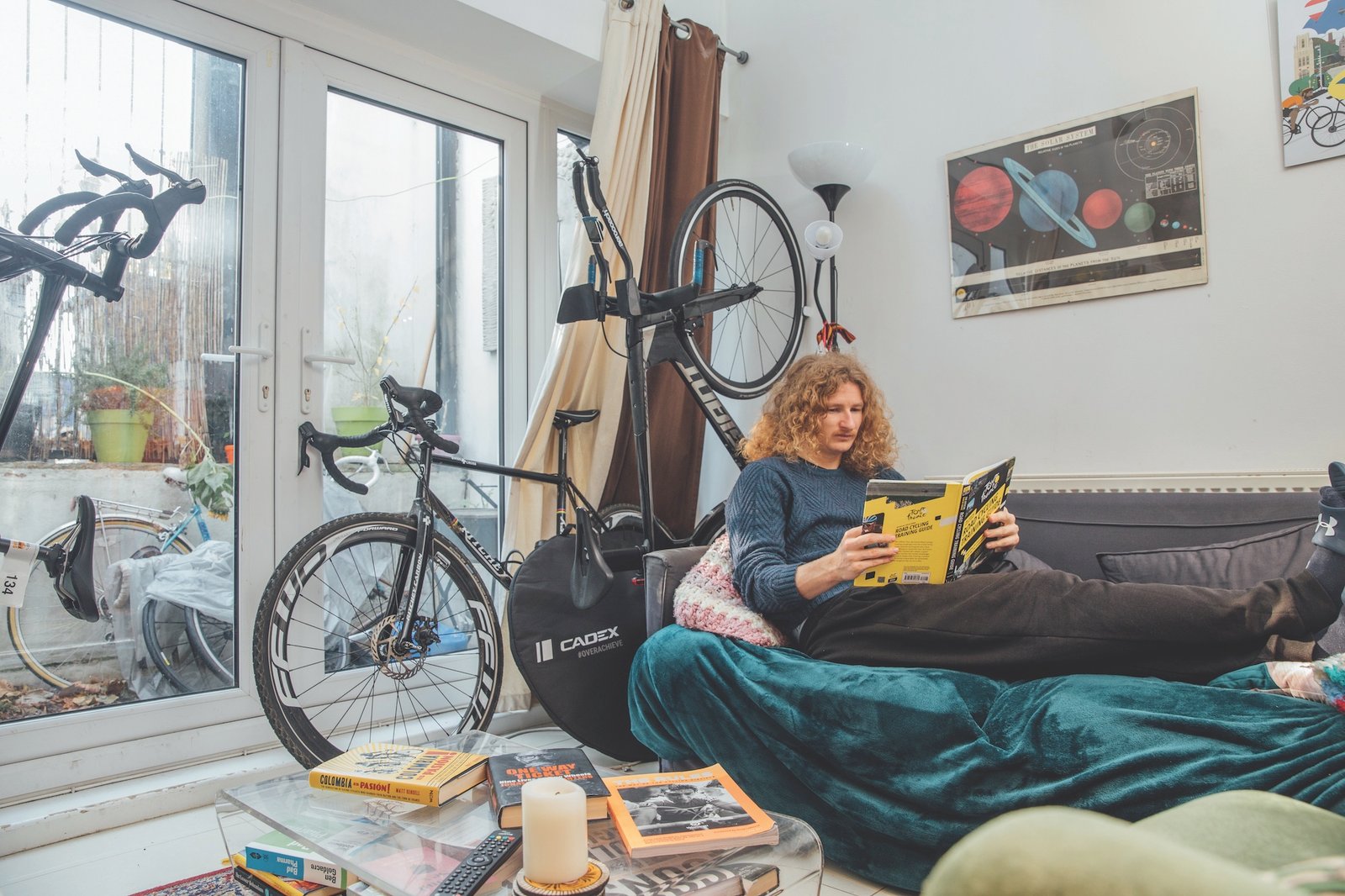 Cyclist relaxing in front room