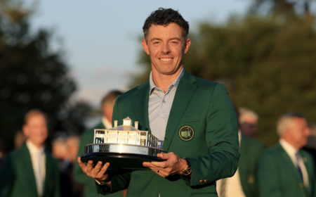 McIlroy defends Masters title to move among the greats