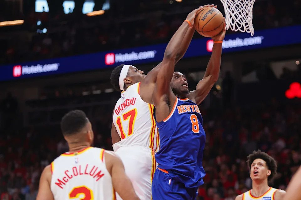 Atlanta Hawks forward Onyeka Okongwu (17) defends the shot of New York Knicks forward Og Anunoby (8) during Game 3 of their first-round playoff series on April 23, 2026.