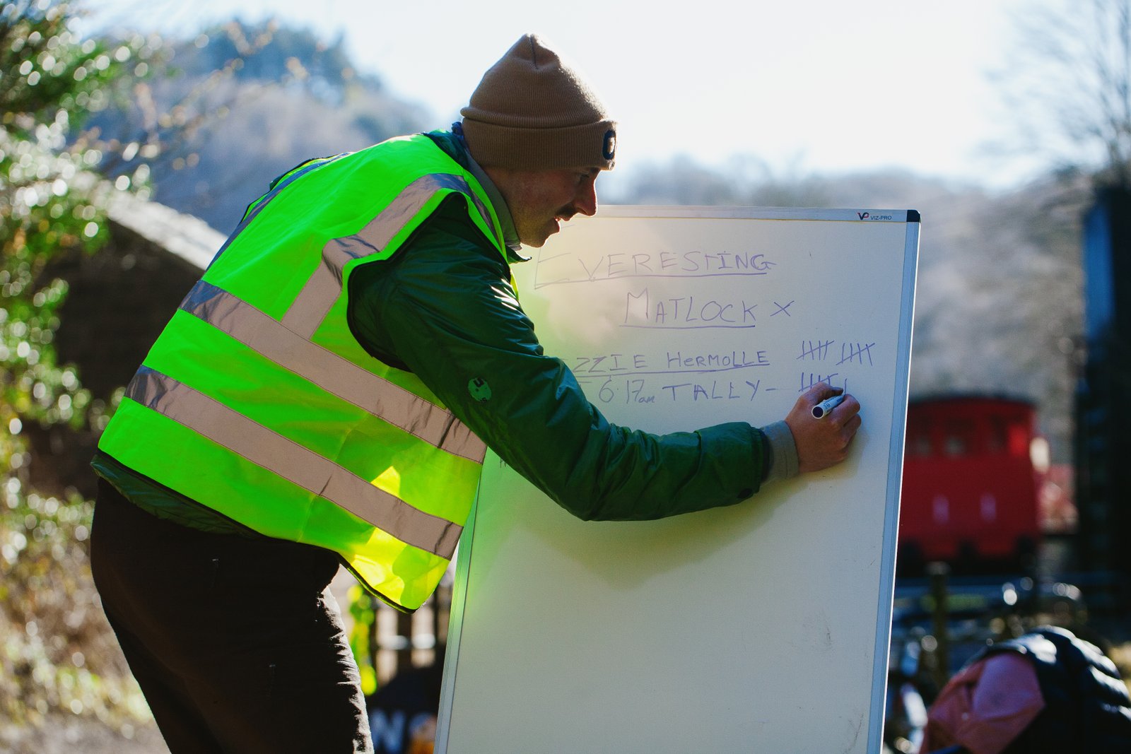 Man writes on whiteboard