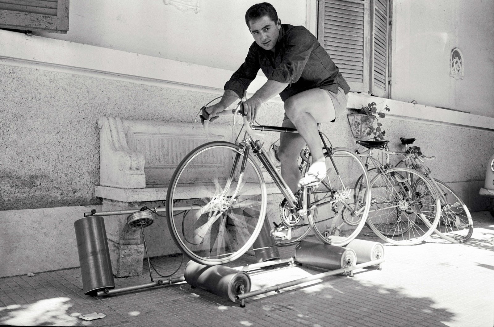 Man cycles on rollers