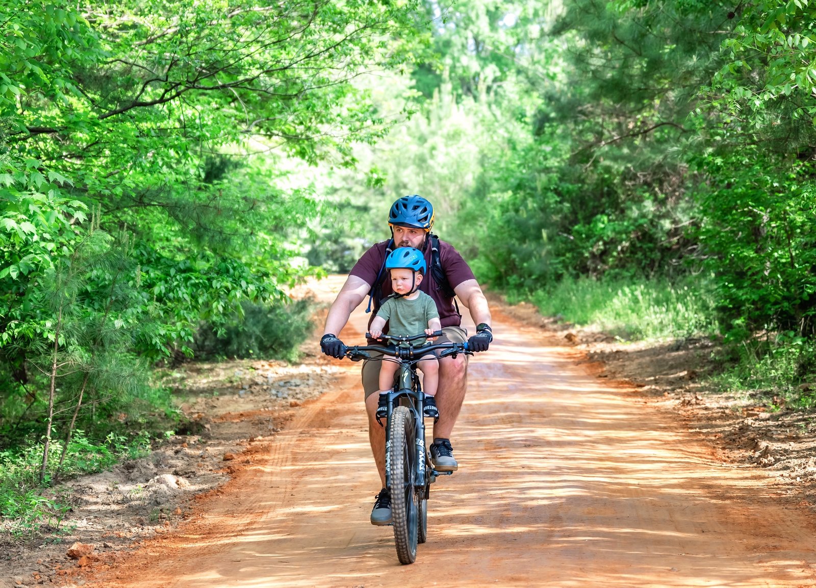 Riding a mountain bike with child