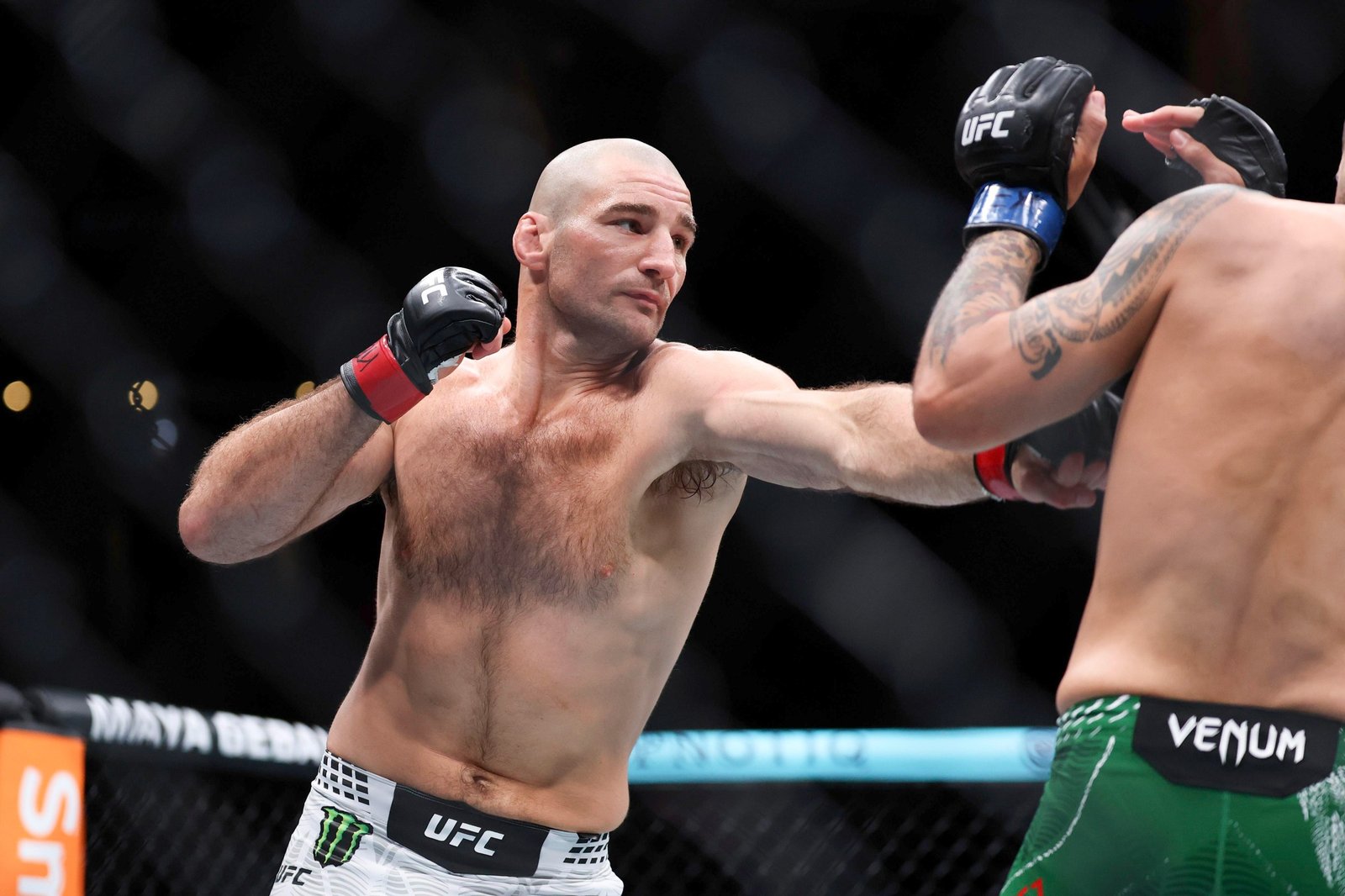 HOUSTON, TEXAS - FEBRUARY 21: Sean Strickland and Anthony Hernandez exchange strikes in a middleweight bout during UFC Fight Night at Toyota Center on February 21, 2026 in Houston, Texas. (Photo by Jack Gorman/Getty Images)