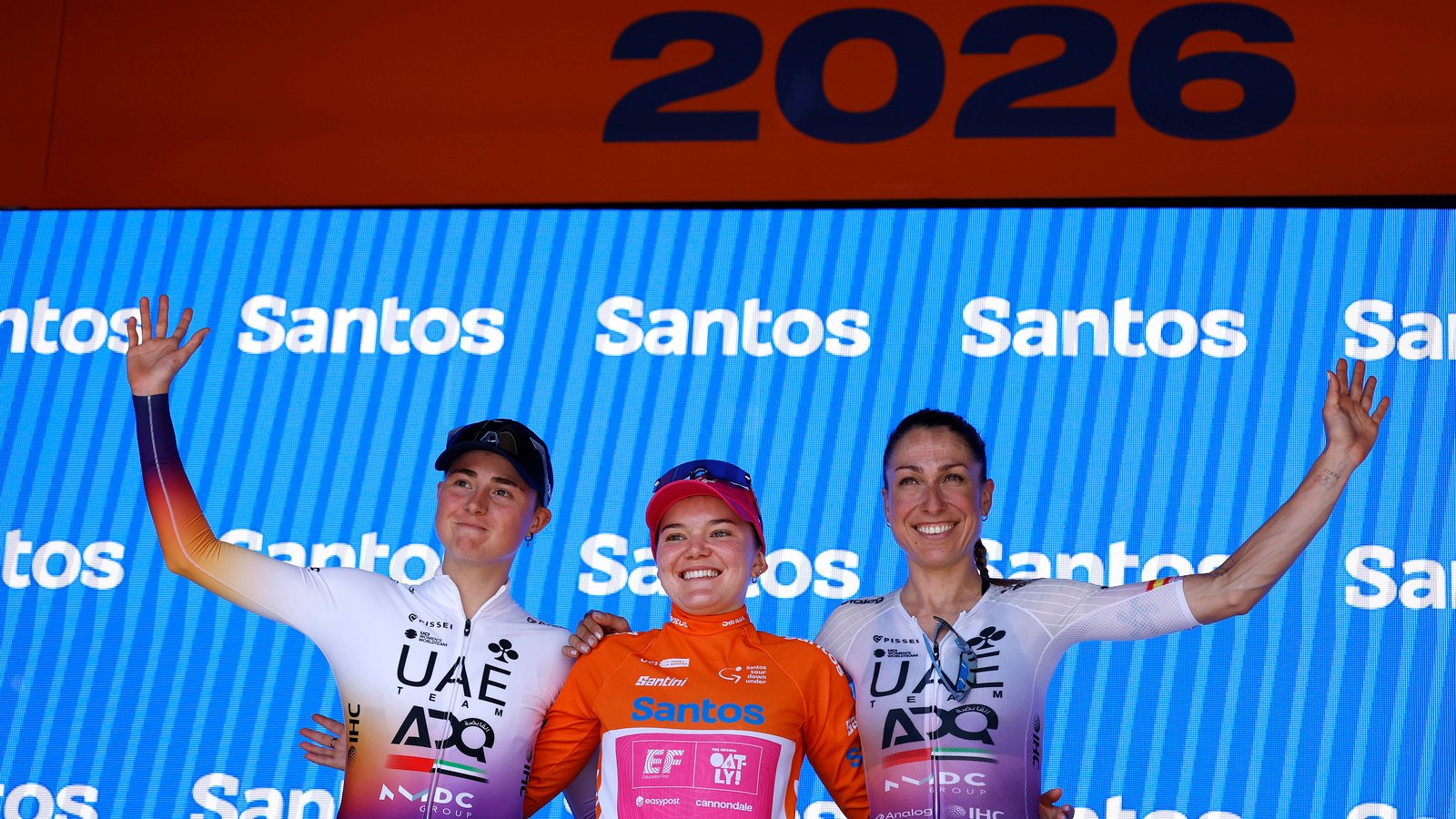 (L-R) Paula Blasi of Spain and UAE Team ADQ on 3rd place, race winner Noemi Ruegg of Switzerland and Team EF Education-Oatly - Orange Santos Leader's Jersey and Mavi Garcia of Spain and UAE Team ADQ