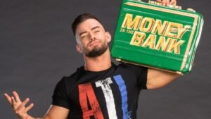 WWE’s Austin Theory Recalls Failed MITB Cash-In, Tense Moment With Roman Reigns