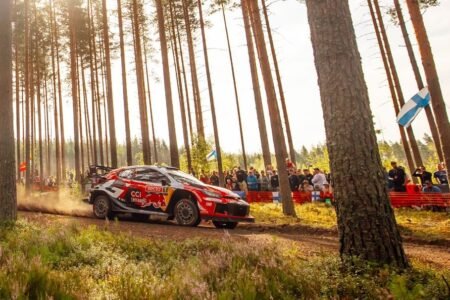 Ogier in command after torrential rain shakes up order