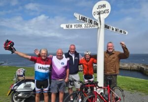 ‘I was blown off my bike twice’ – 83-year-old sets new record for riding Land’s End to John O’Groats