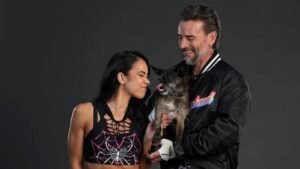 WWE Stars CM Punk & AJ Lee Reflect On Passing Of Their Dog Larry