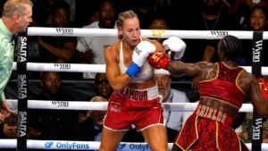 Claressa Shields Stops Kaye Scott in Sixth Round