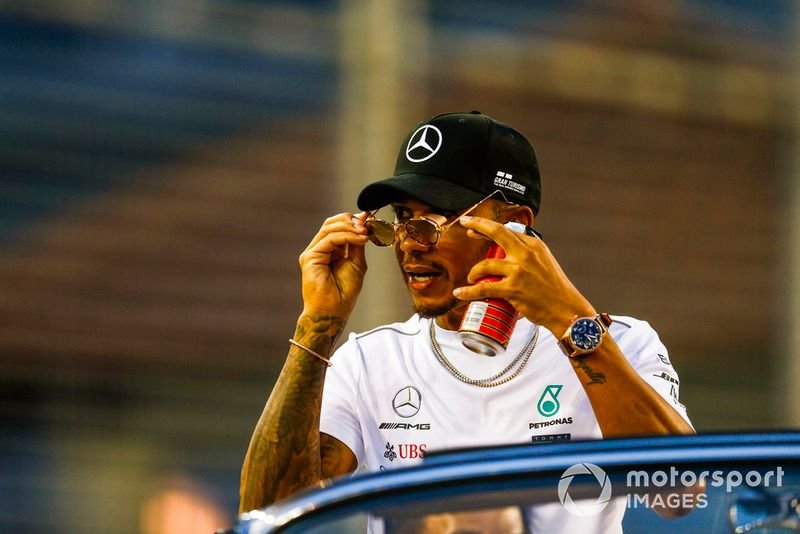 Hamilton arrived late in Singapore after the fashion shows, but Wolff defended his driver against criticism