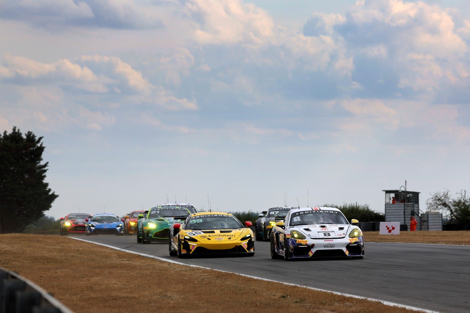 Gamble (l) and Bradshaw had a close battle at the start of race two, but the McLaren ultimately prevailed