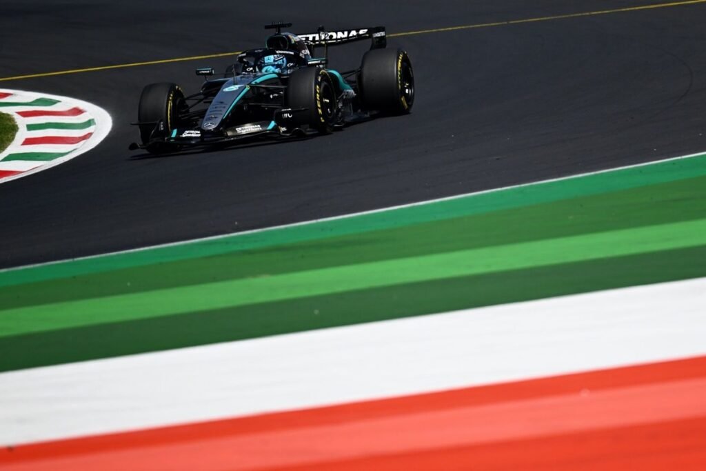 Russell beats Leclerc to top second practice